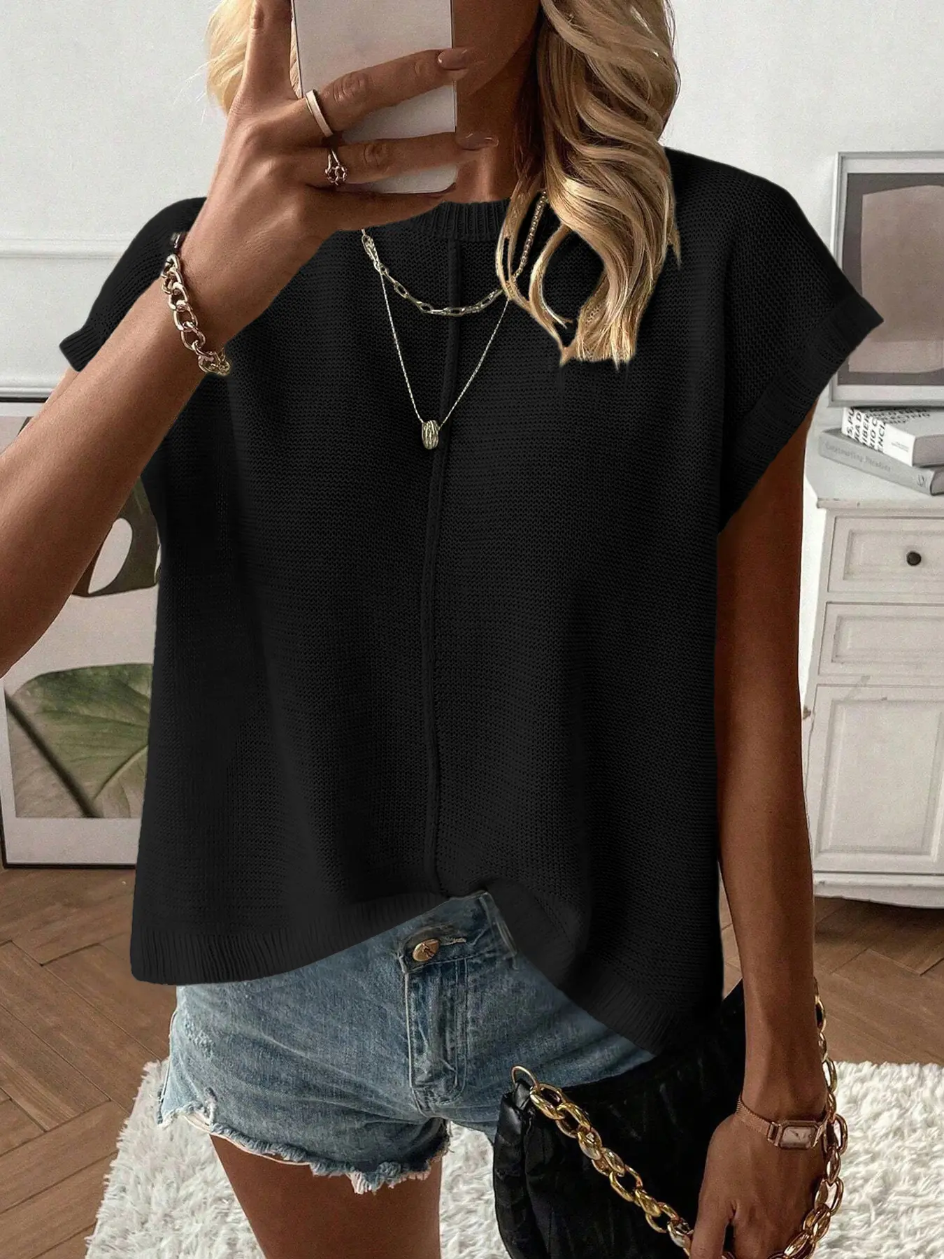 Black relaxed knit vest