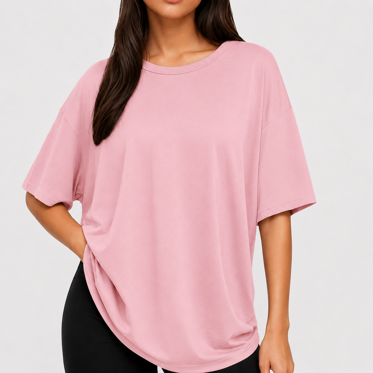 Eight women wearing oversized tees in eight colors