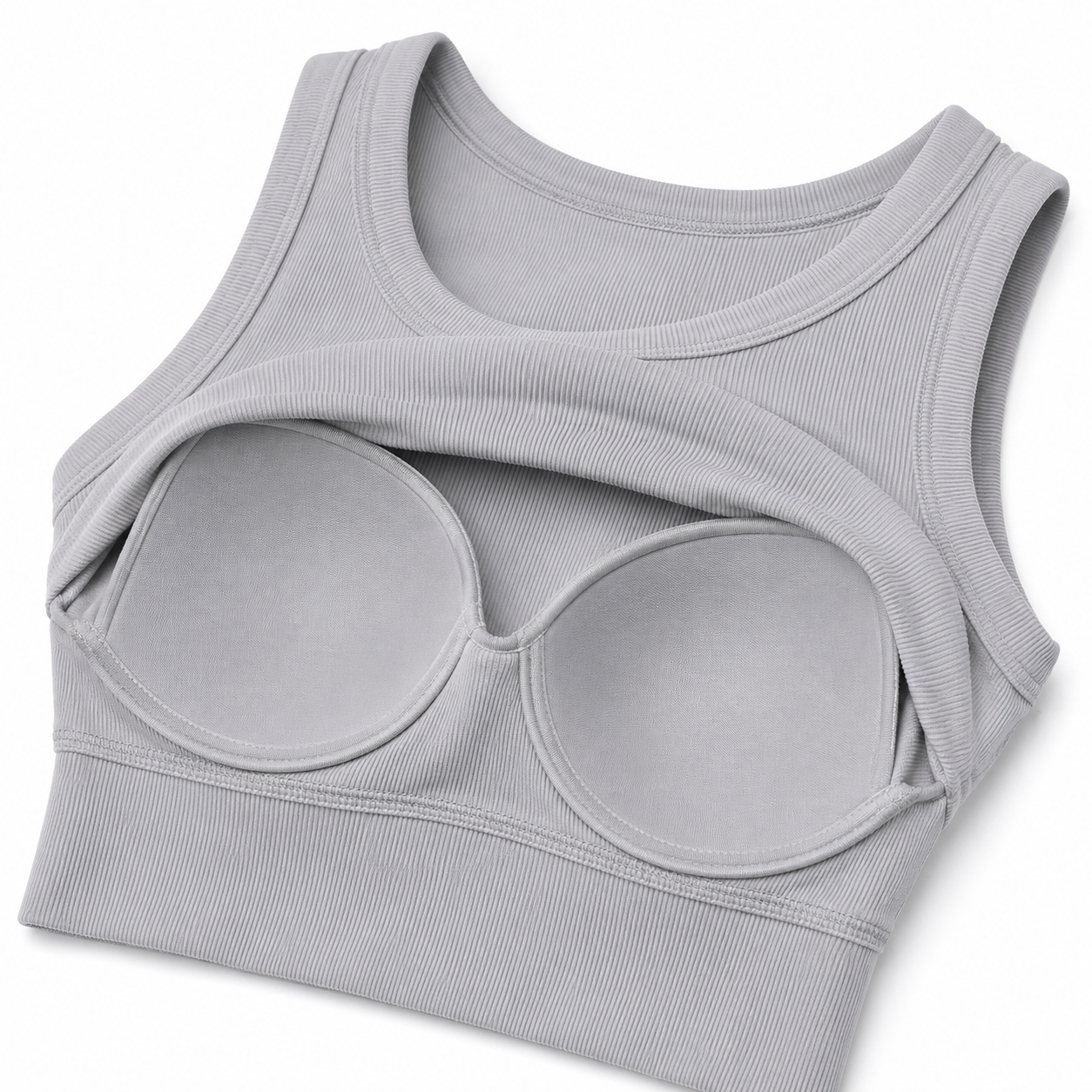 Women's sleeveless tank top with built-in bra; casual, ribbed, slim-fit style featuring a crisscross open back.