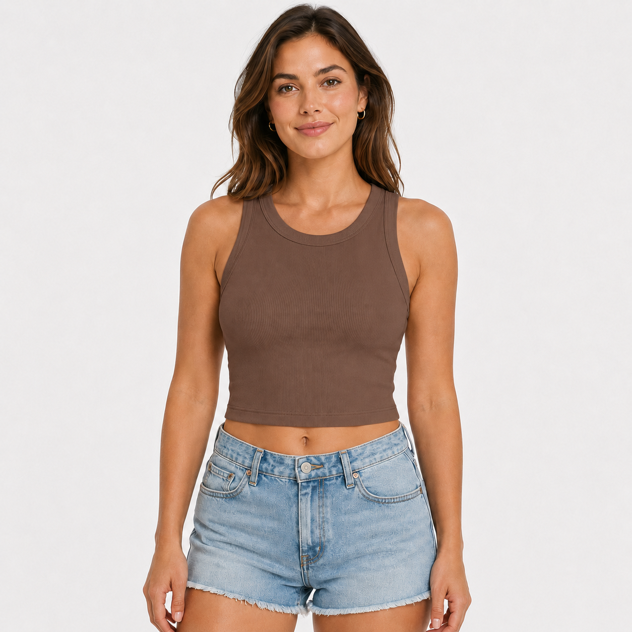 Women's sleeveless tank top with built-in bra; casual, ribbed, slim-fit style featuring a crisscross open back.