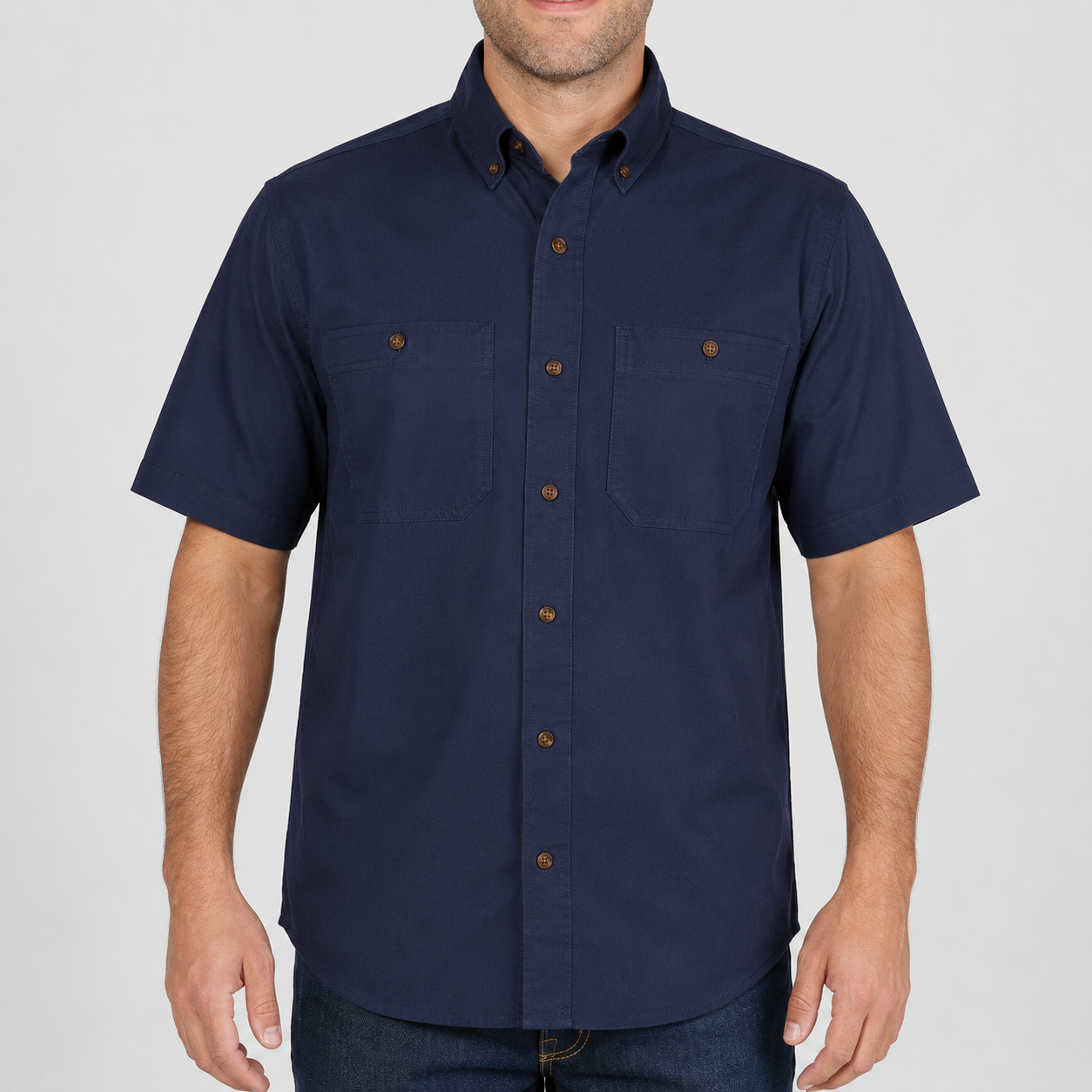 Button-down collar, placket, stitching, and brown button detail