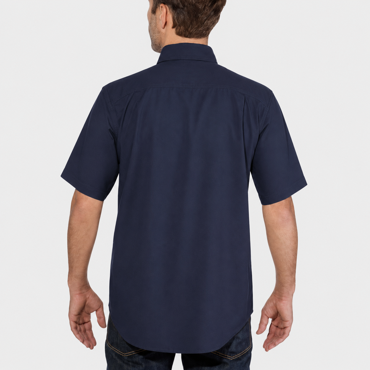 Dual buttoned chest pocket construction and front fit detail