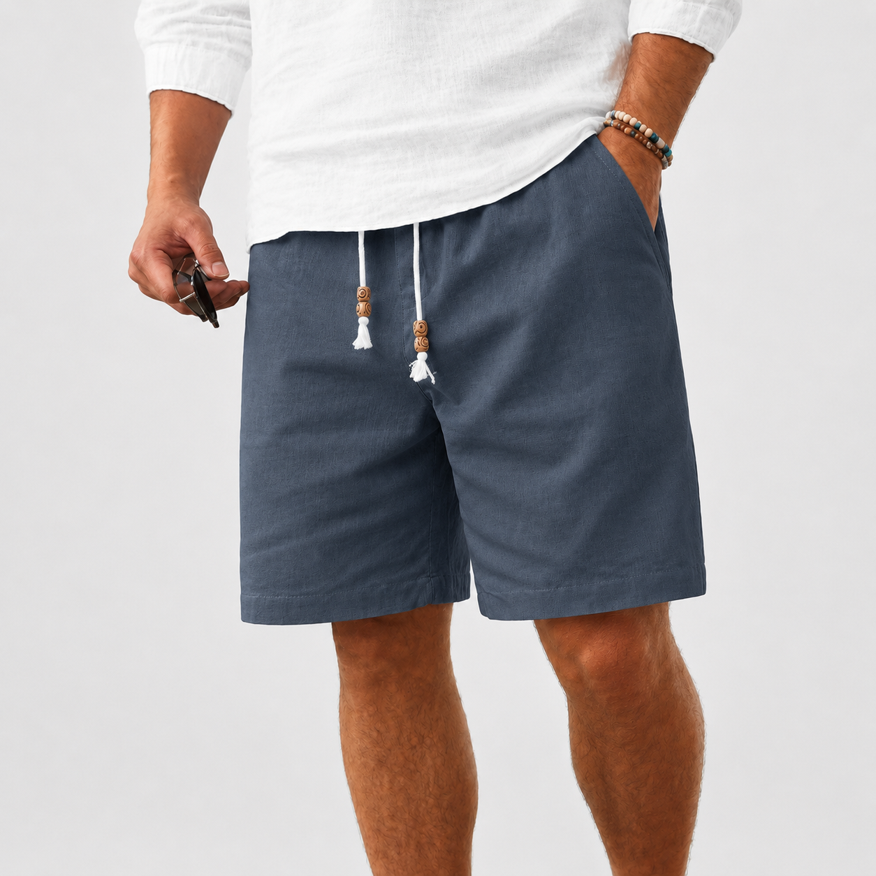 Men's linen shorts, elastic waistband with drawstring, casual style.