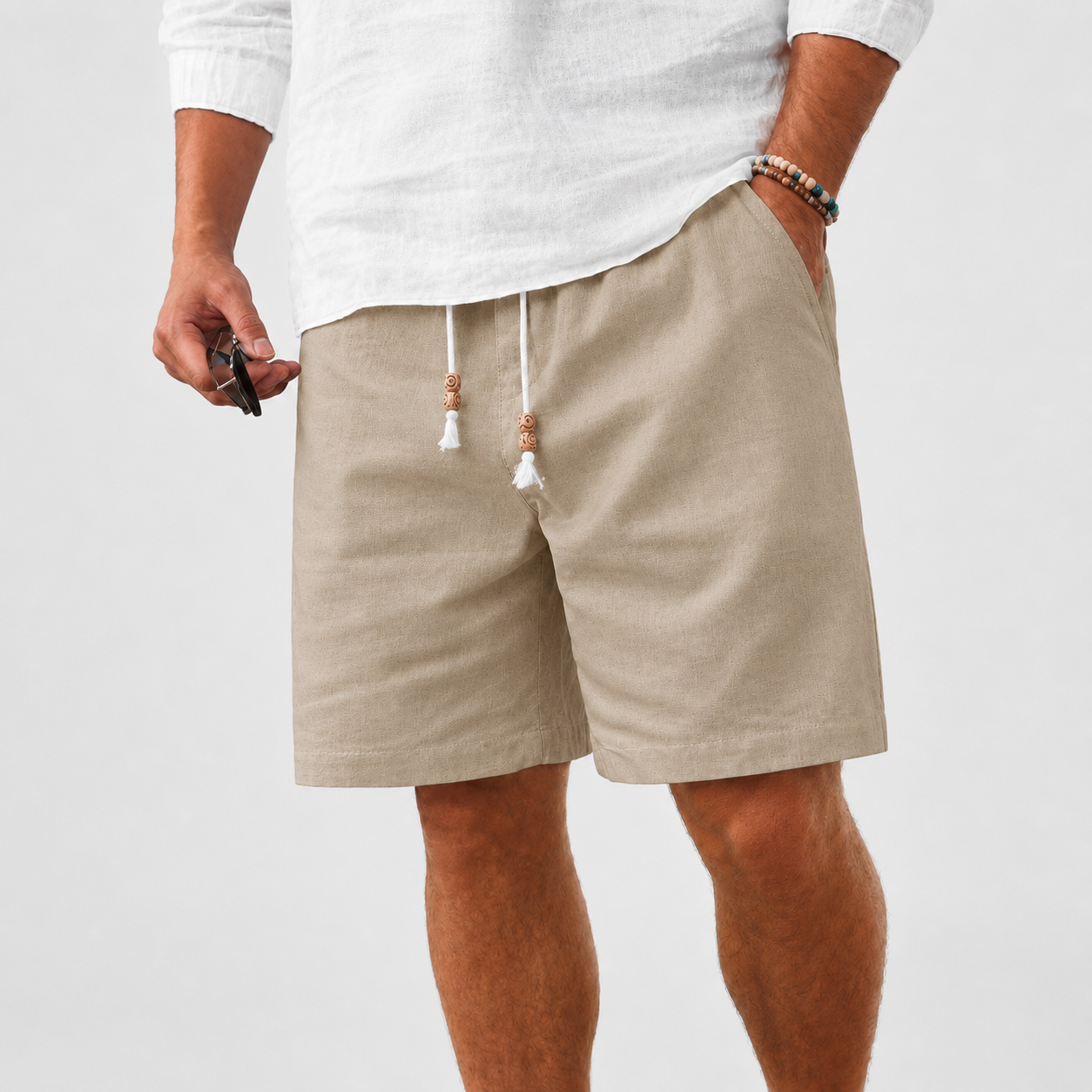 Men's linen shorts, elastic waistband with drawstring, casual style.