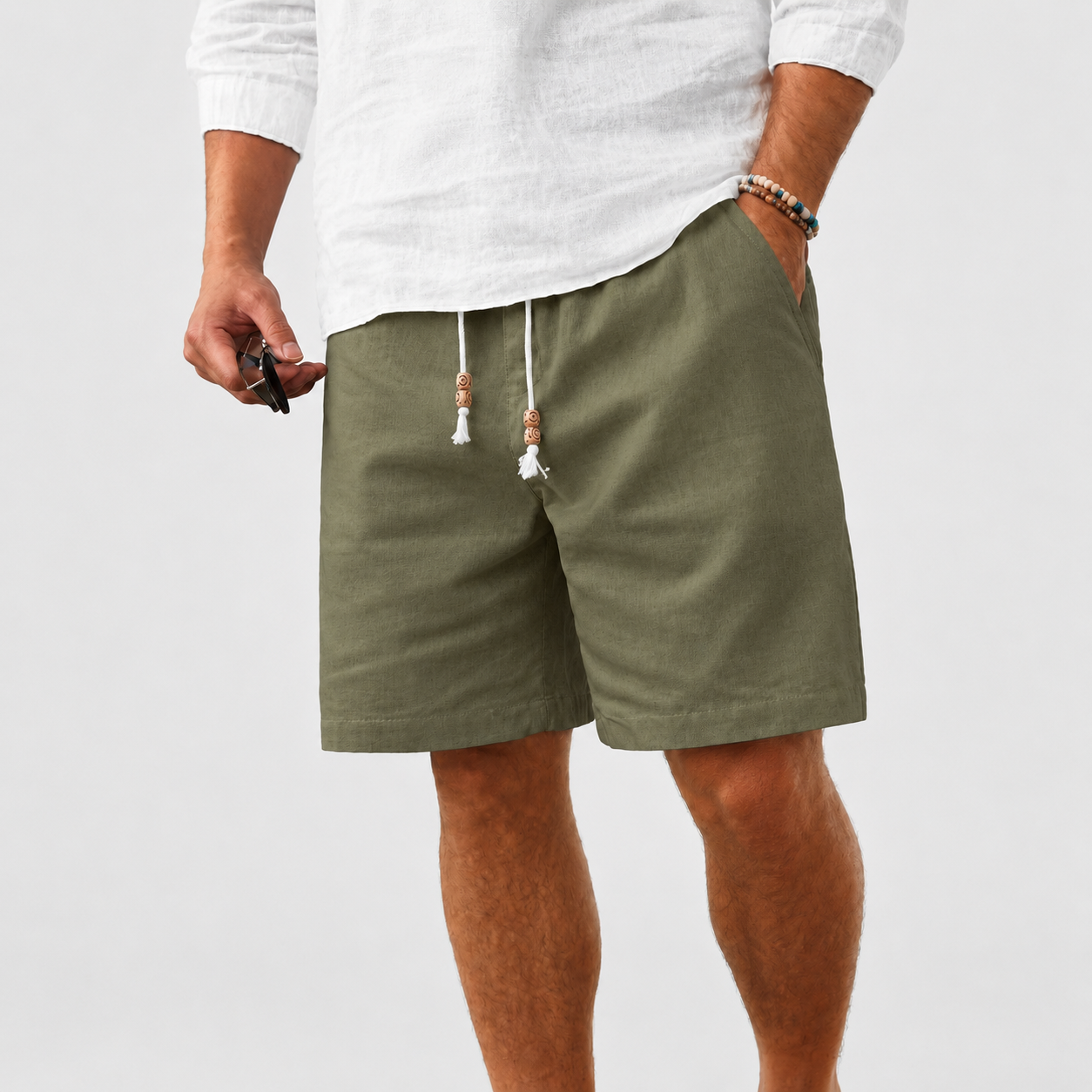 Men's linen shorts, elastic waistband with drawstring, casual style.