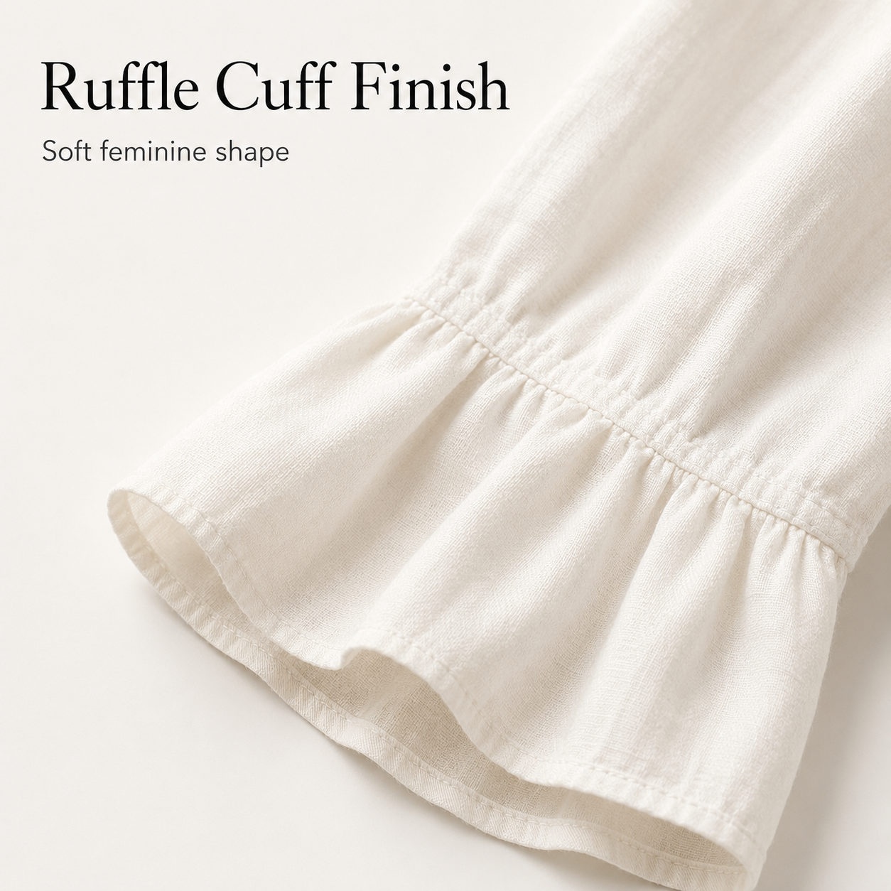 Ruffle cuff finish and clean sleeve stitching detail