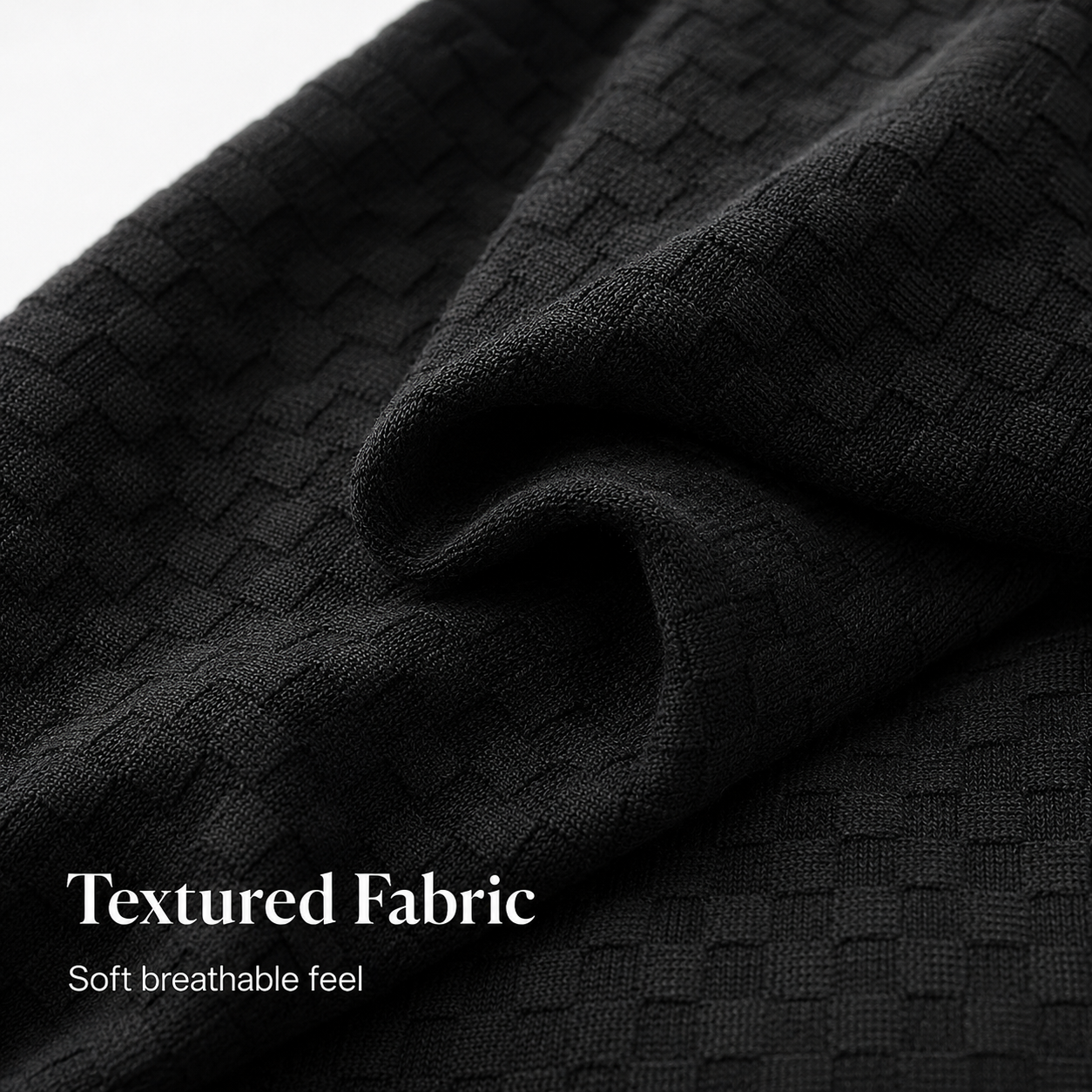 Raised textured fabric detail on black two-piece set