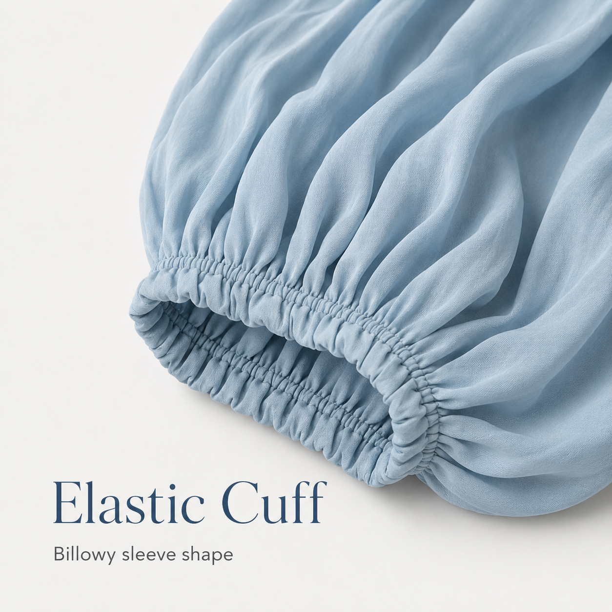 Elastic cuff and billowy sleeve detail