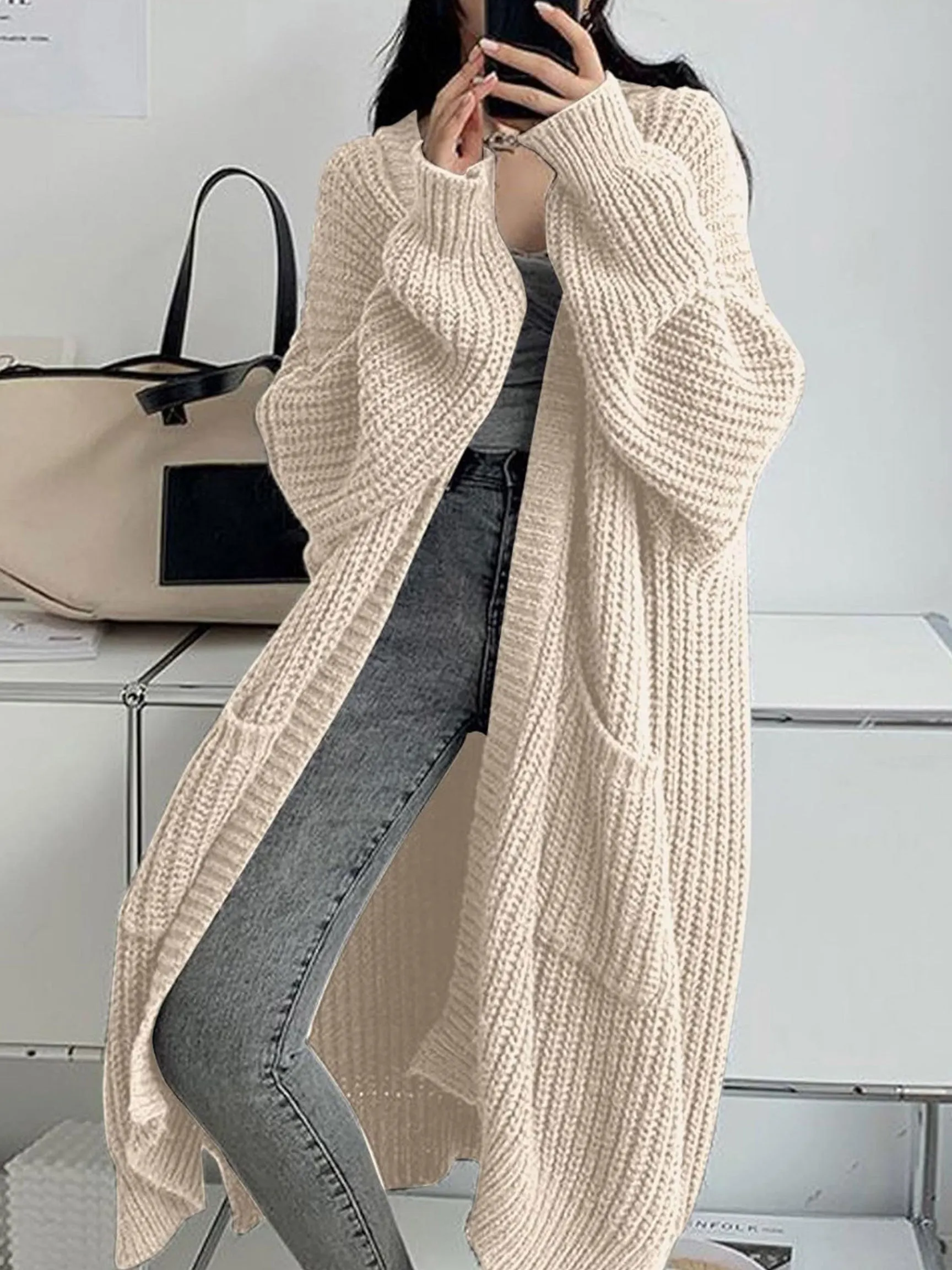 Locker geschnittener, langer Strickcardigan für Damen, dicker Strickmantel, mit Taschen