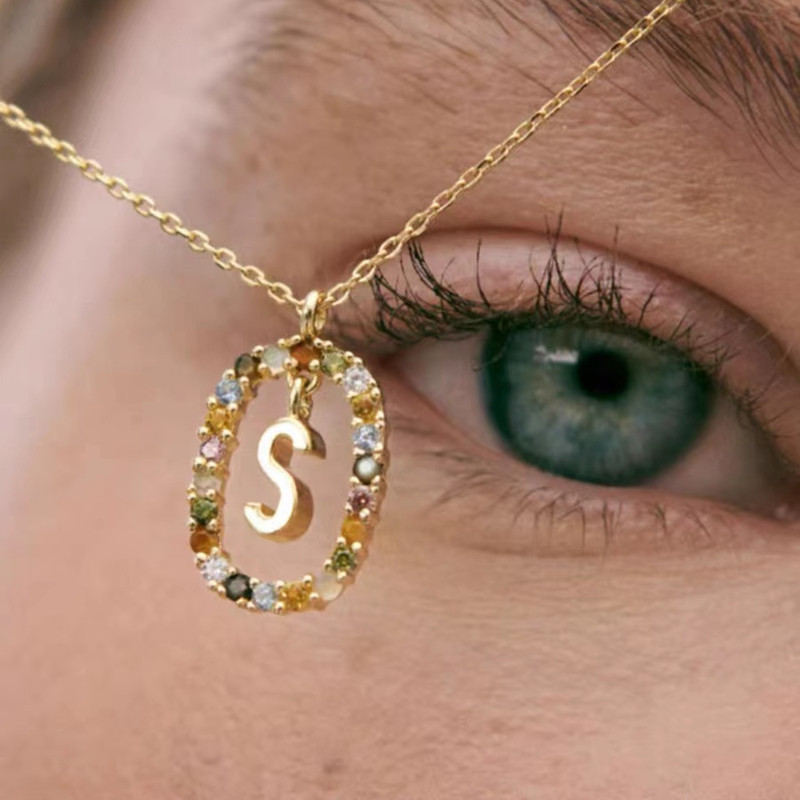 Personalized Gemstone Initial Necklace��A Symbol of Uniqueness