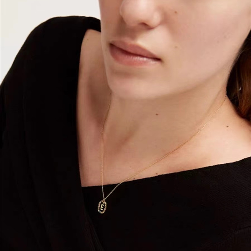 Personalized Gemstone Initial Necklace��A Symbol of Uniqueness