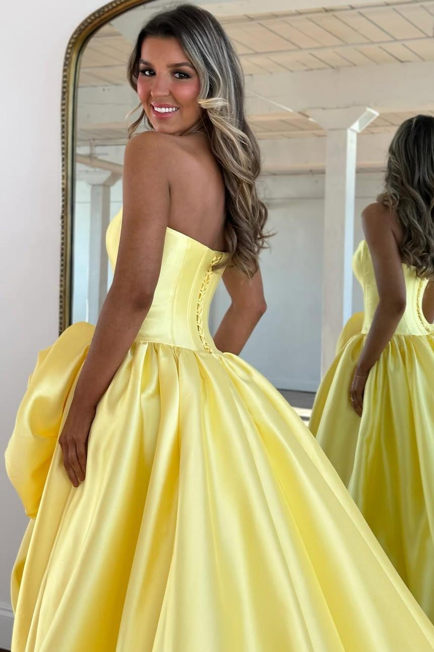 Luxury Strapless Corset Prom Gown with High Slit Skirt and Rosette Accent