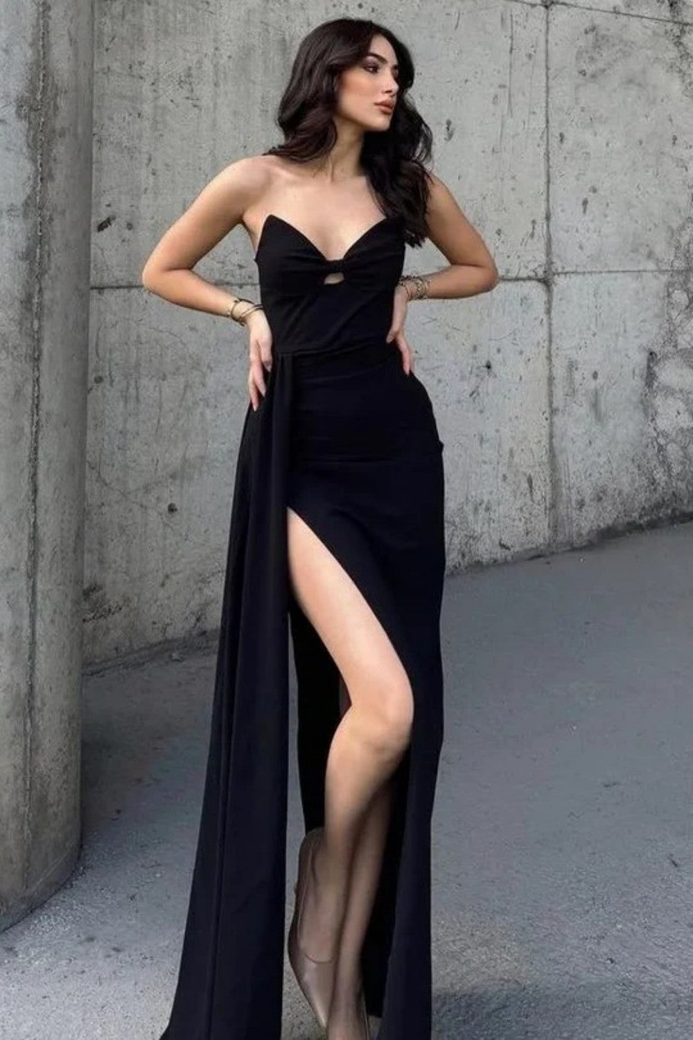 Dramatic Black Cutout Dress with Thigh-High Slit and Draped Detail
