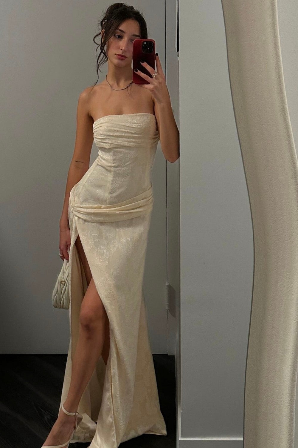 Elegant Ivory Strapless Sheath Prom Gown with Draped Waist & Slit