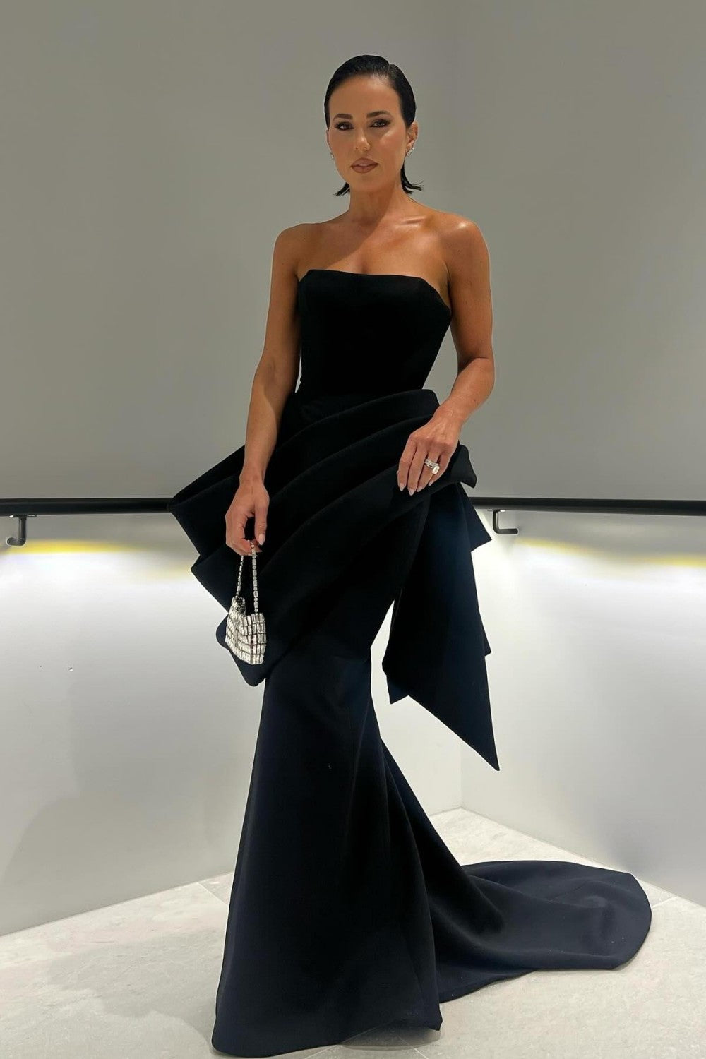 Elegant Strapless Black Mermaid Gown with Statement Draping