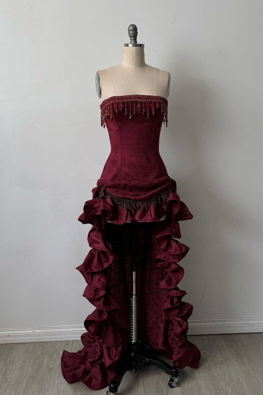 Elegant Strapless High-Low Evening Dress with Tassel Beading & Ruffles