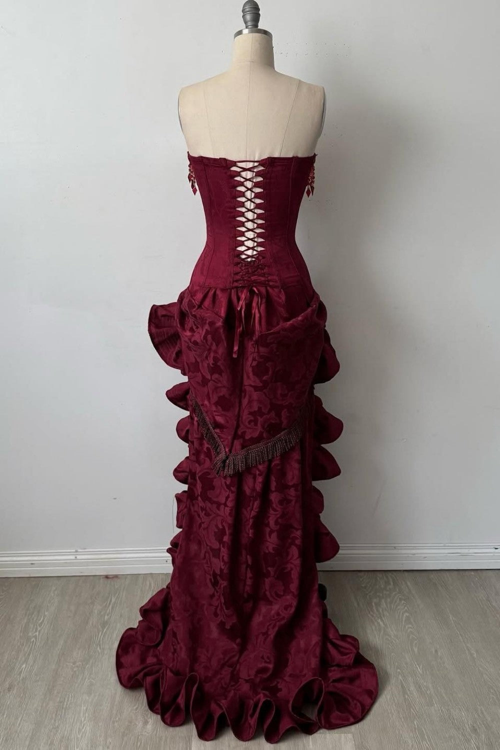 Elegant Strapless High-Low Evening Dress with Tassel Beading & Ruffles