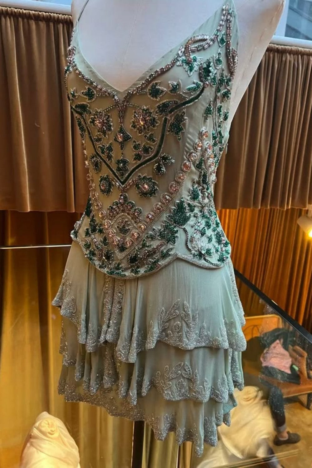 Glamorous Homecoming Dress with Beaded Embellishments and Layered Skirt