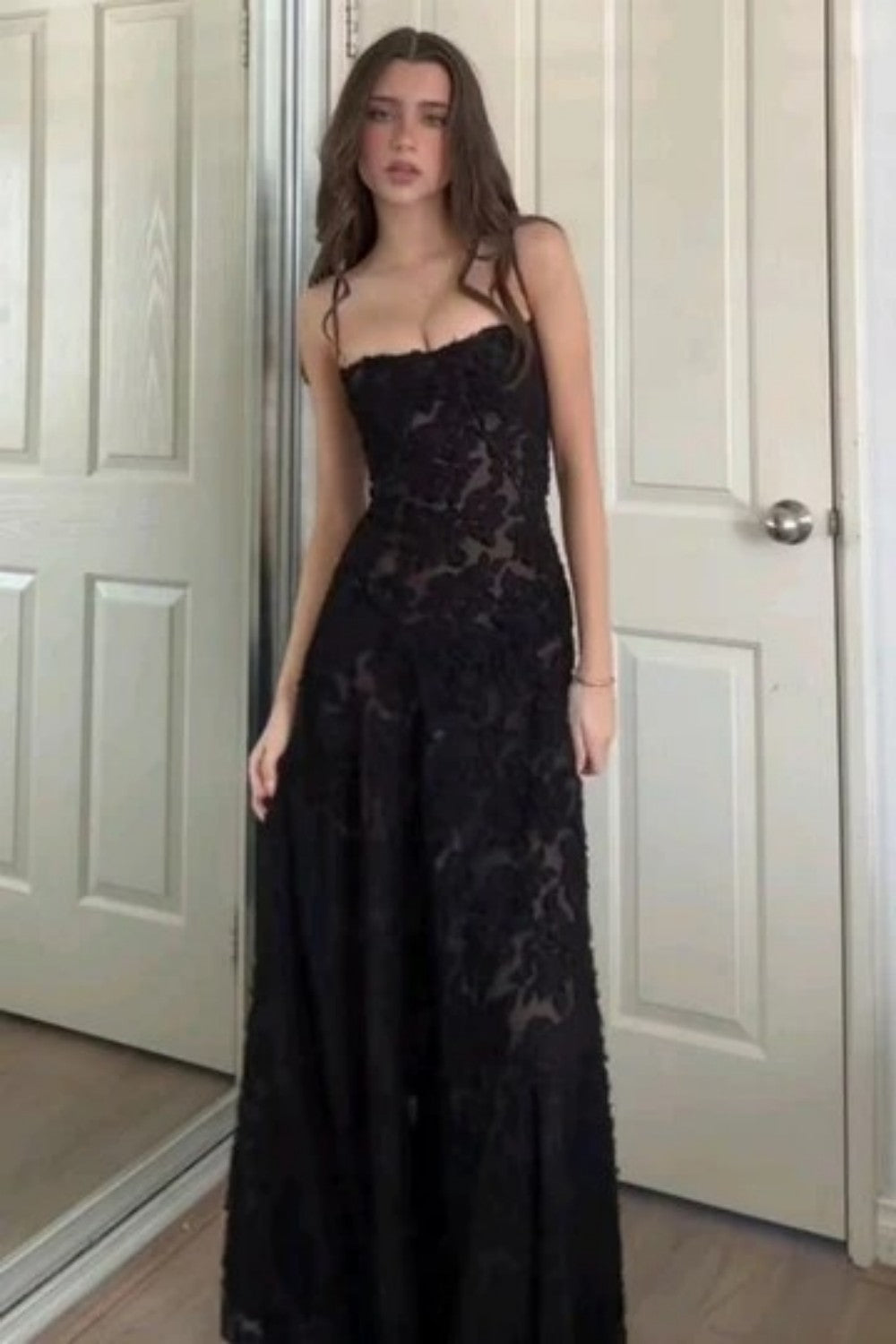 Sleek Black Lace Formal Dress with Spaghetti Straps and Flared Skirt