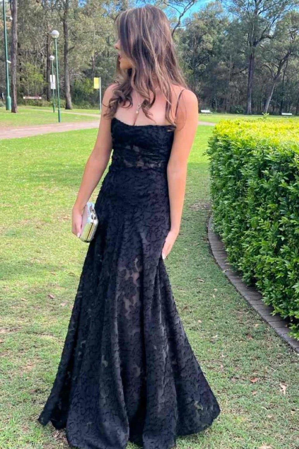 Sleek Black Lace Formal Dress with Spaghetti Straps and Flared Skirt