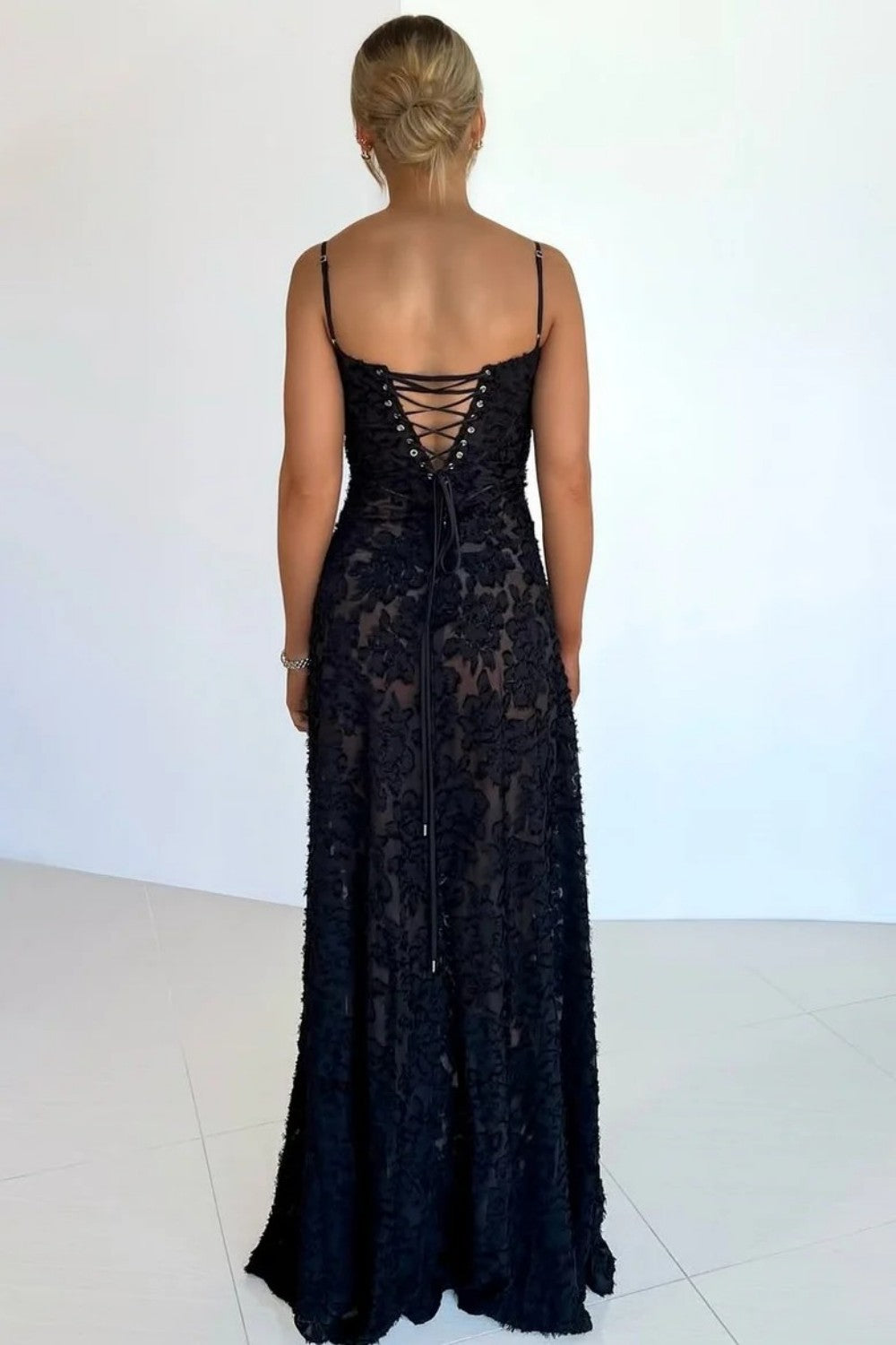 Sleek Black Lace Formal Dress with Spaghetti Straps and Flared Skirt