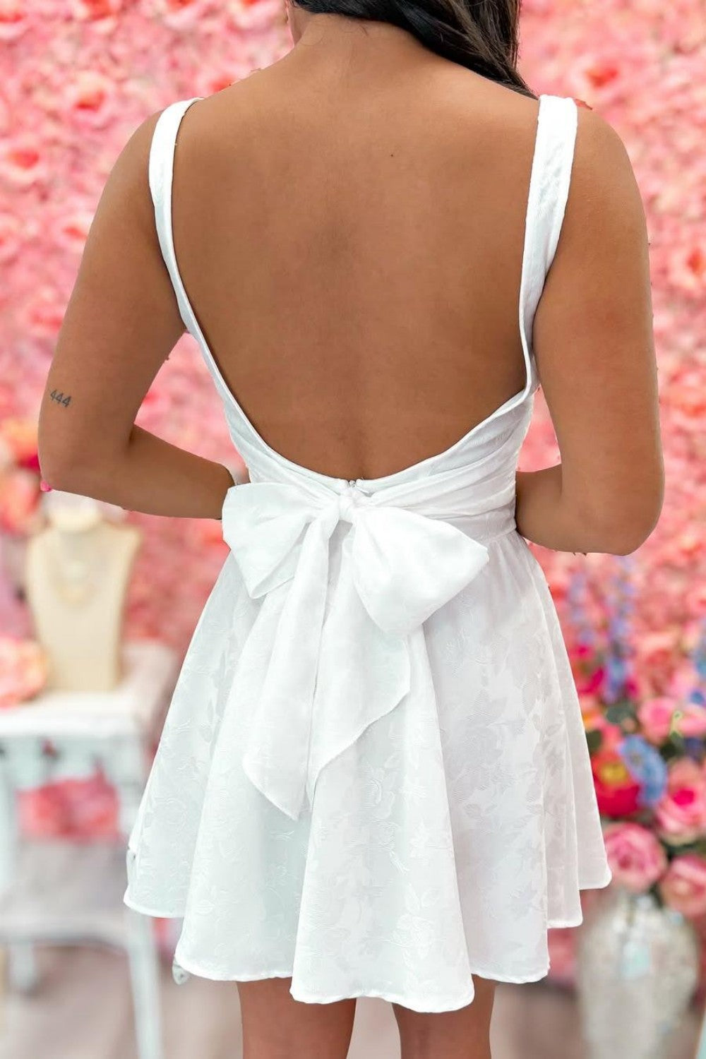 White Open Back Mini Homecoming Dress with Bow Detail and Flared Skirt