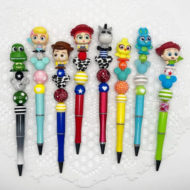 Toy Story inspired autograph pen, beaded ballpoint pen with Disney Doorable, Woody, Jessie, Rex, Bo Peep, Bunny, Ducky, Slinky