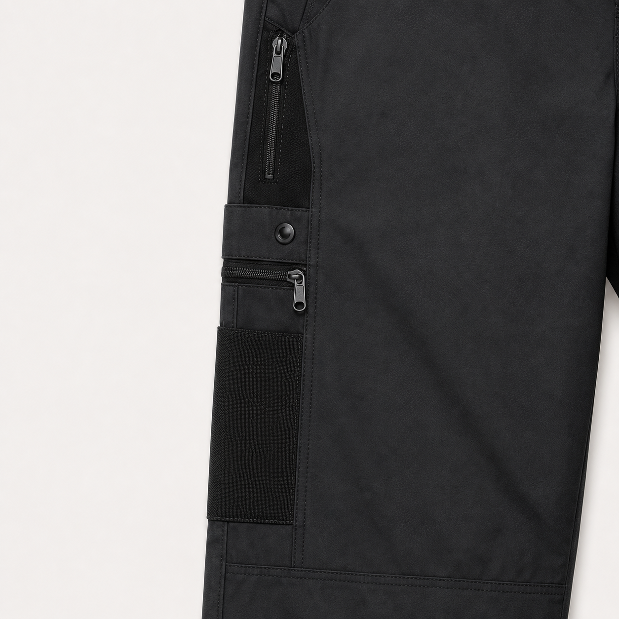 Secure thigh zipper and reinforced utility pocket detail