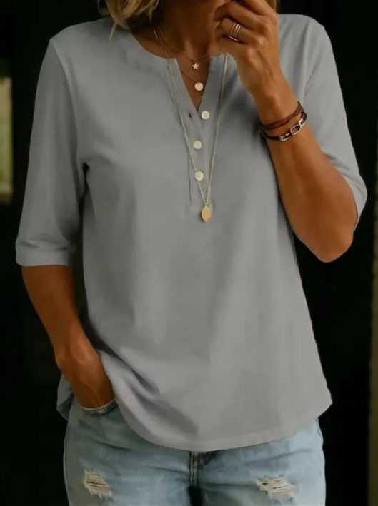 Women's short-sleeve polo shirt with a collar, featuring a waffle-knit design—perfect for everyday outings and weekend wear.