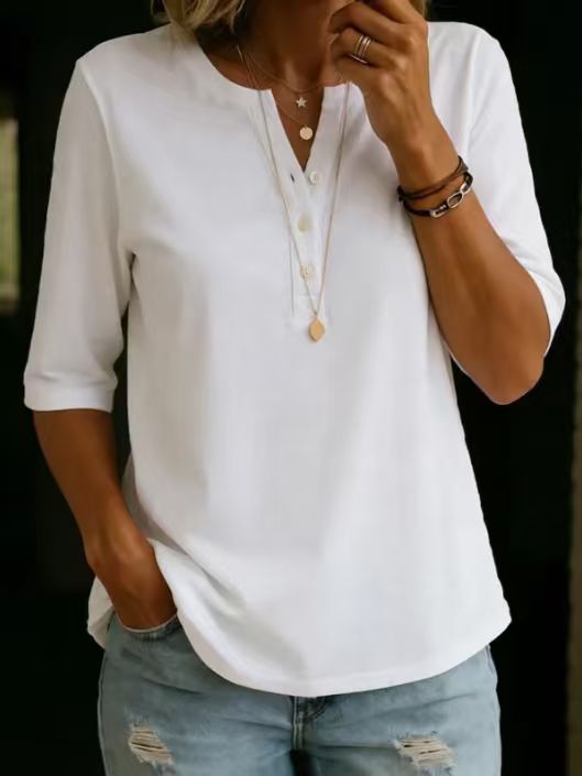 Women's short-sleeve polo shirt with a collar, featuring a waffle-knit design—perfect for everyday outings and weekend wear.