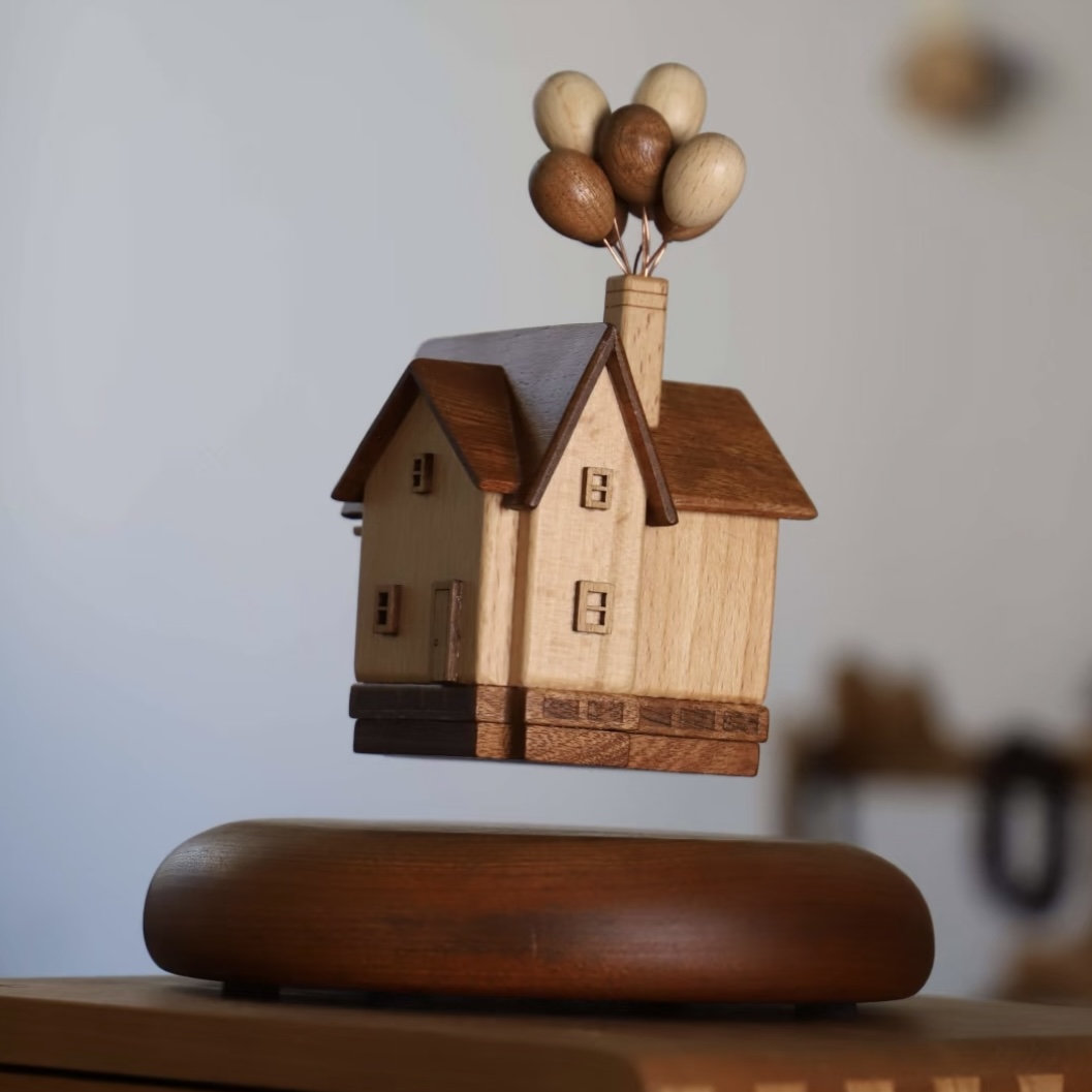Magnetic levitation wooden ‘UP’ house