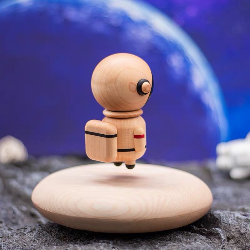 Magnetic levitation wooden astronaut