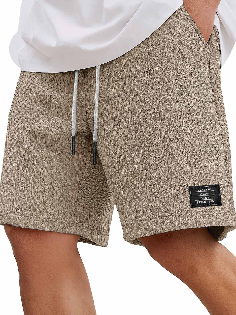 Herrenmode Freizeitliche tägliche strukturierte Stoff bestickte Logo Taschen Shorts-ZierMode