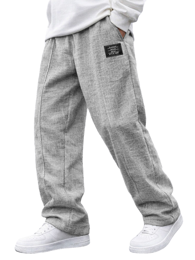 Herren modische lässige Leinenhosen mit elastischem Bund, bestickte Logo-Taschen-deurabatt