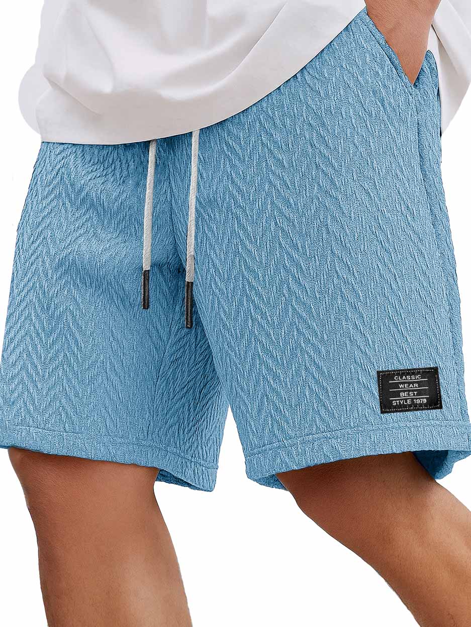 Herrenmode Freizeitliche tägliche strukturierte Stoff bestickte Logo Taschen Shorts-ZierMode