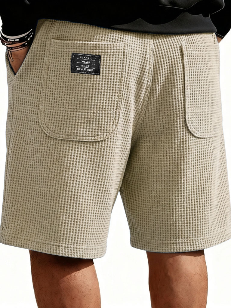 Herrenmode Freizeit Waffelmantel mit doppelten Taschen lockere Shorts-ZierMode
