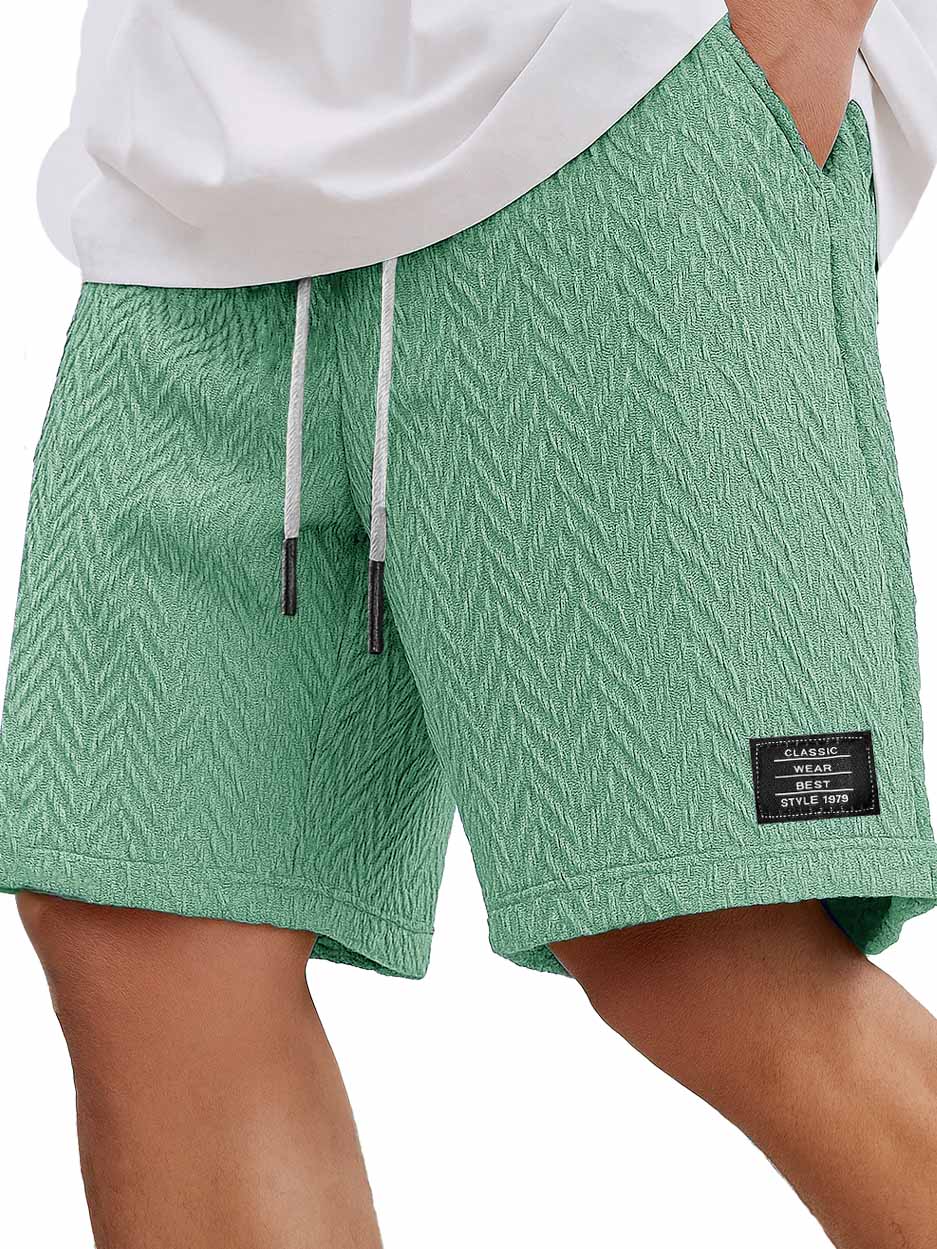 Herrenmode Freizeitliche tägliche strukturierte Stoff bestickte Logo Taschen Shorts-ZierMode