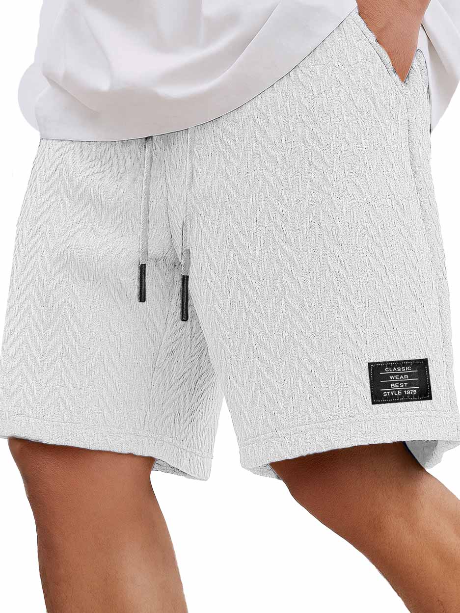 Herrenmode Freizeitliche tägliche strukturierte Stoff bestickte Logo Taschen Shorts-ZierMode