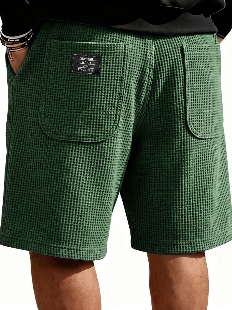 Herrenmode Freizeit Waffelmantel mit doppelten Taschen lockere Shorts-ZierMode