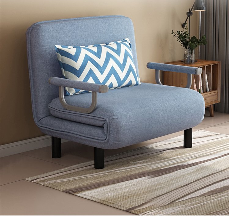 Blue folding sofa bed in living room setting