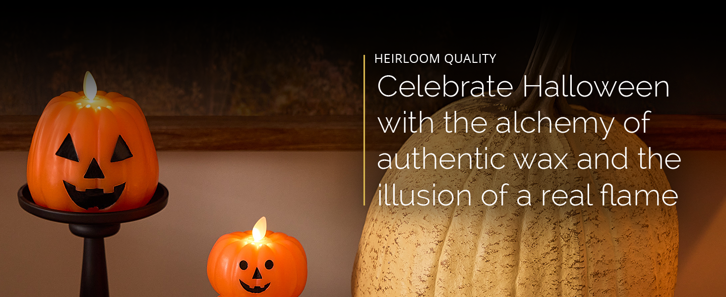 Pumpkin candle on shelf surrounded by autumn pumpkins and home decor