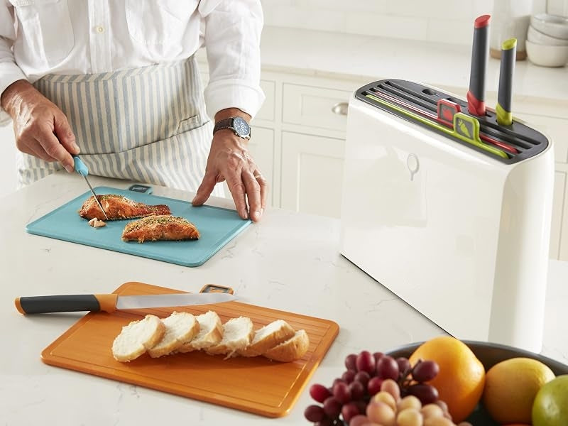 Four stainless steel kitchen knives