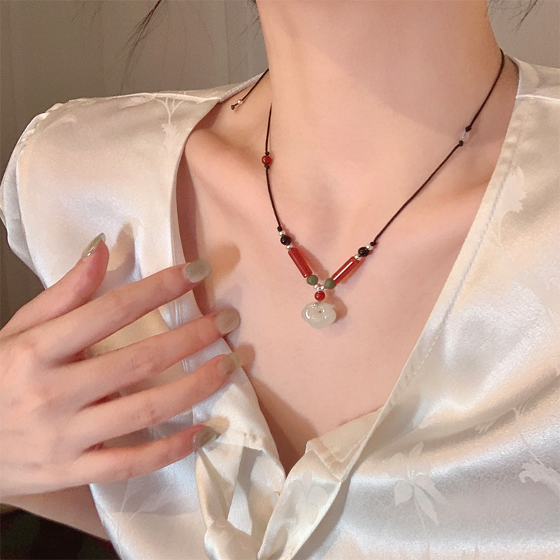 Black Cord as Paper, Gemstones as Ink—An Eastern Poem for the Neck