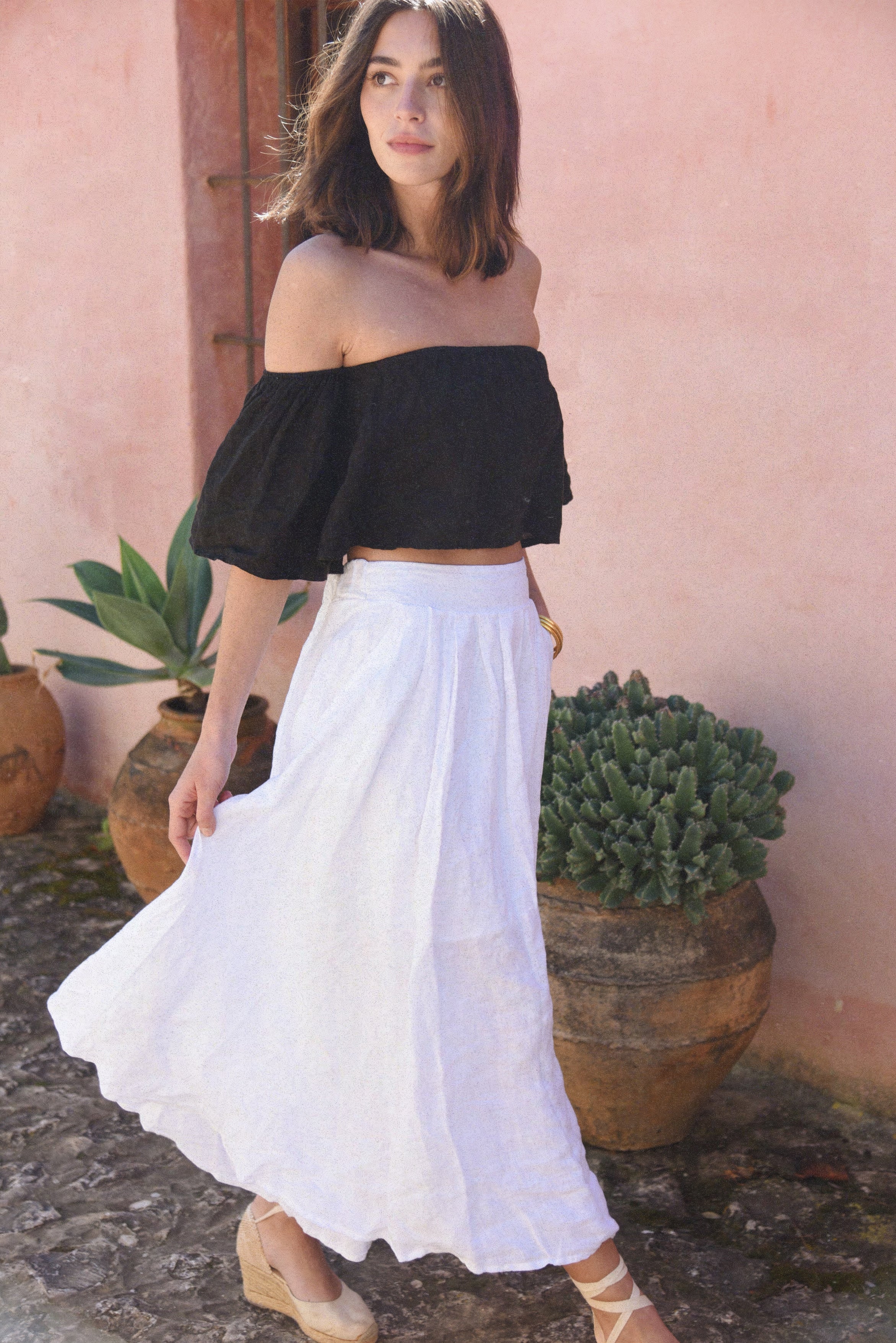 “Soft knits and breezy linen—your new uniform for slow mornings and sunny days.”