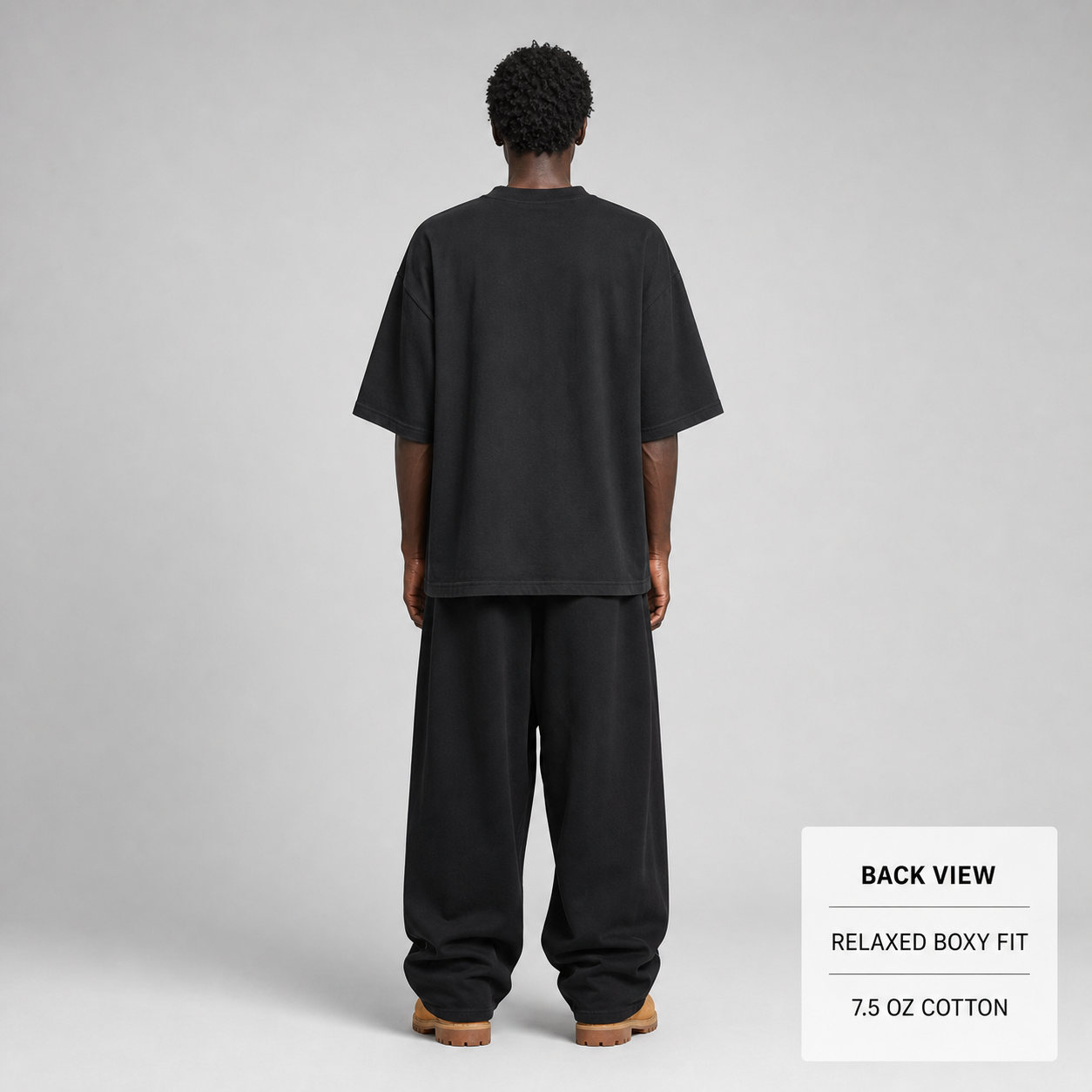 Back view of the black heavyweight oversized cotton T-shirt