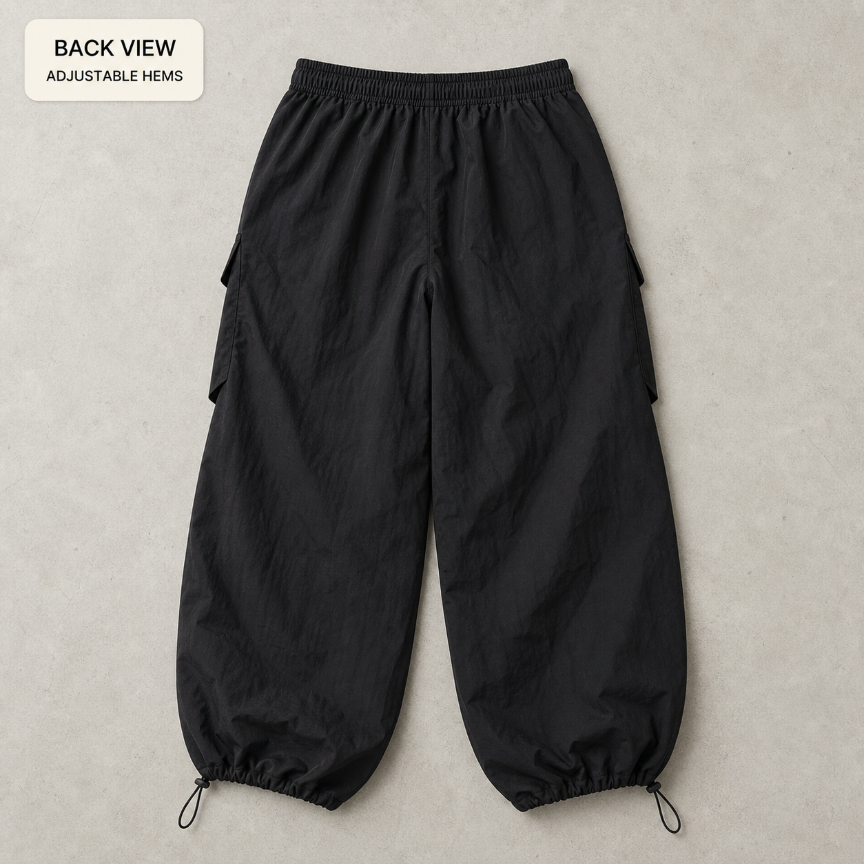 Rear view showing elastic waist, loose back panel and gathered ankle hems