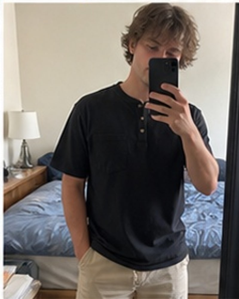 Natural phone-style photo of Men's Loose Fit Midweight Short Sleeve Pocket Henley Multipack