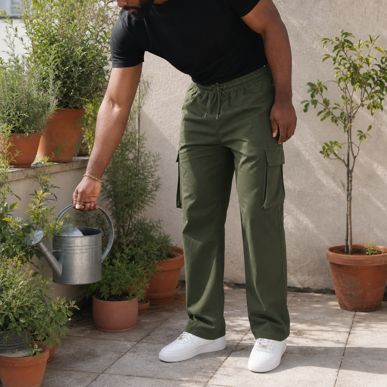 Olive Green cargo pants in a sunlit garden