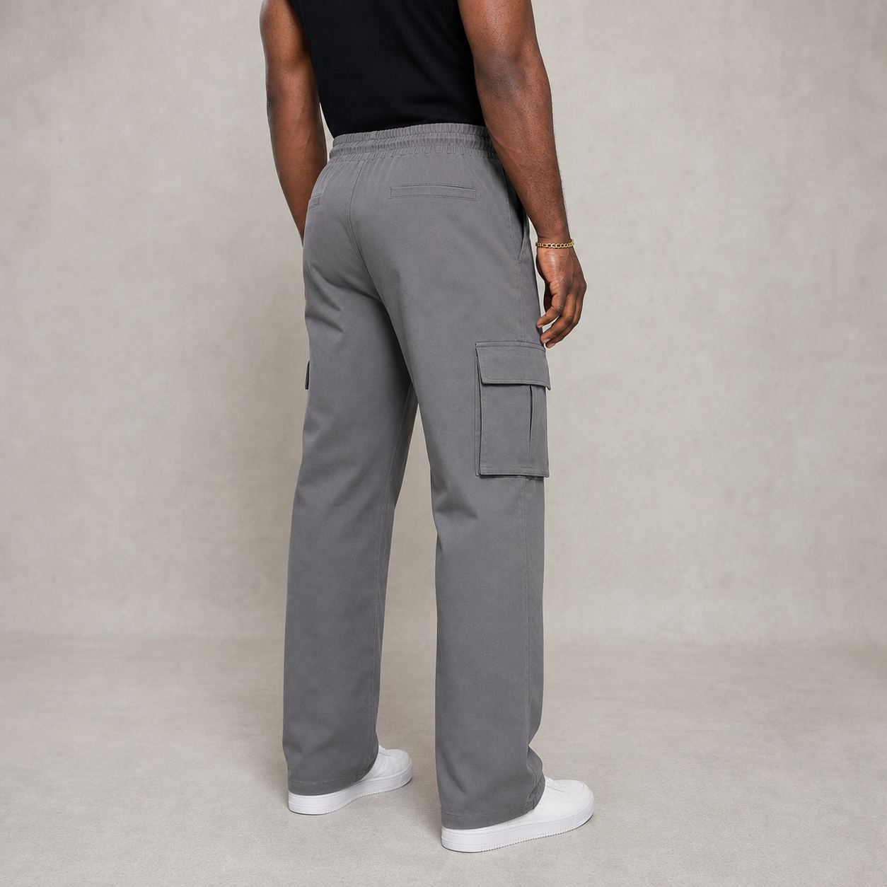 Rear three-quarter view of adjustable-waist cargo pants