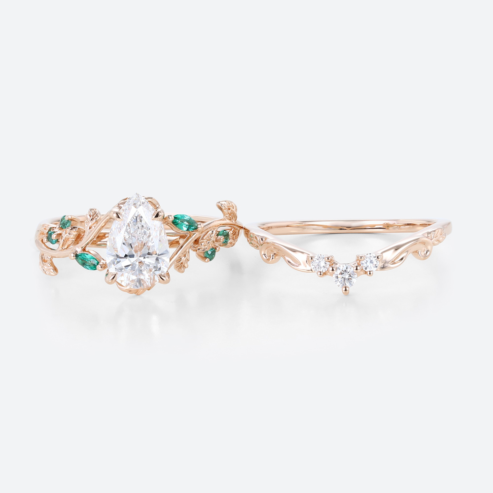 1ct Pear Cut Lab Diamond Bridal Ring Set with Nature-Inspired Emerald Side Stone in Rose Gold